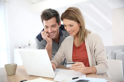 Couple at home buying on internet