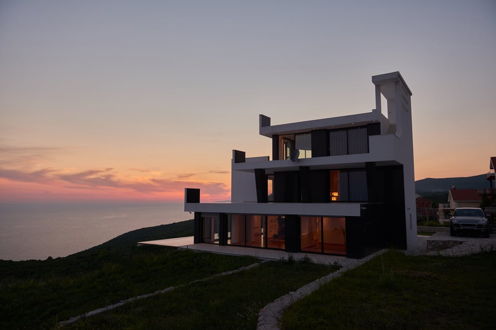 External view of a contemporary house modern villa at  sunset-1