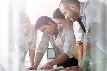 Group of business people in office working on project