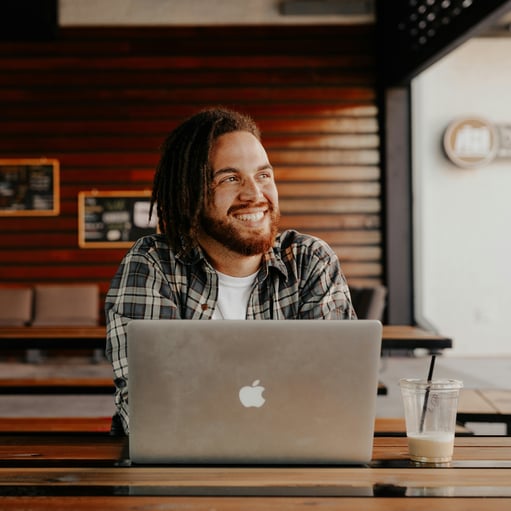 A man with laptop.