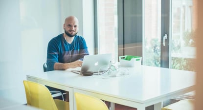 A developer working using a laptop