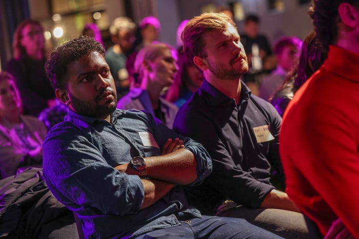 attendees listening to panel