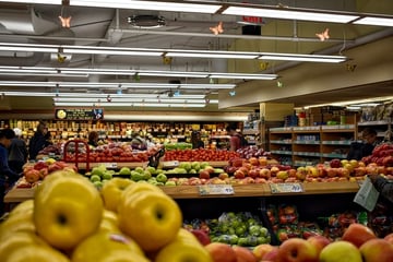 people shopping in groceries store