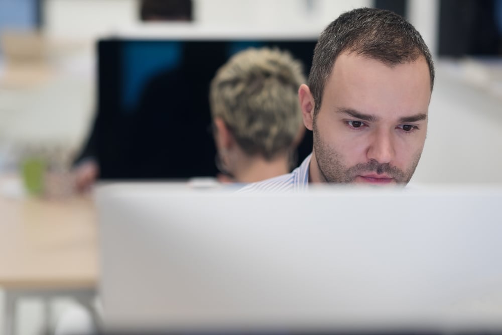 startup business, software developer working on desktop  computer at modern office