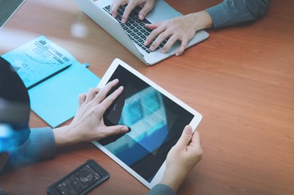 top view of two colleagues using digital pro tablet and laptop computer with Secure payment on the screen as Online shopping concept-1